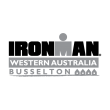 Logo with a gray Ironman figure above white text reading "Western Australia Busselton" on a black background, conveying strength and endurance.