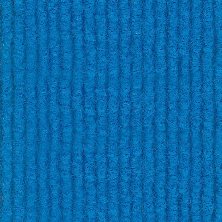 Close-up of a bright blue textured fabric with vertical ridges, giving a ribbed appearance. The vivid color and pattern evoke a cheerful and dynamic mood.