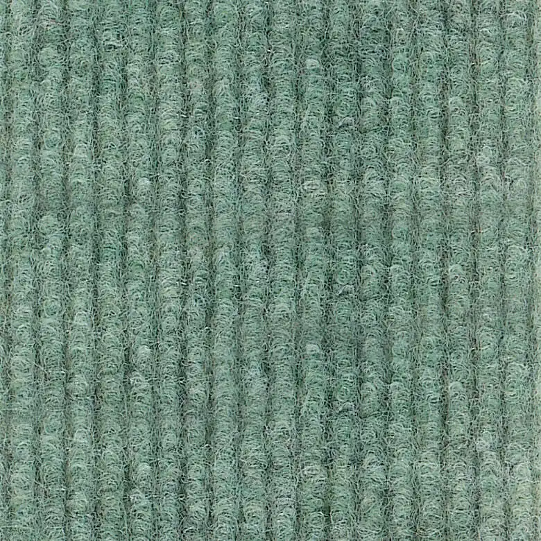 Close-up of a textured, fairway green corduroy fabric with vertical ridges. The pattern creates a soft and soothing appearance.