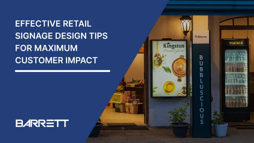 A retail shop entrance featuring illuminated promotional signage, a vertical bubble tea shop sign, a framed tea advertisement, and a refrigerated drinks display, showcasing different types of retail signage used to attract customers.